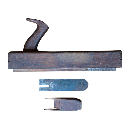 An antique hand tool wooden bench plane